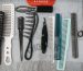Peignes, brosses et ciseaux de coiffure alignés